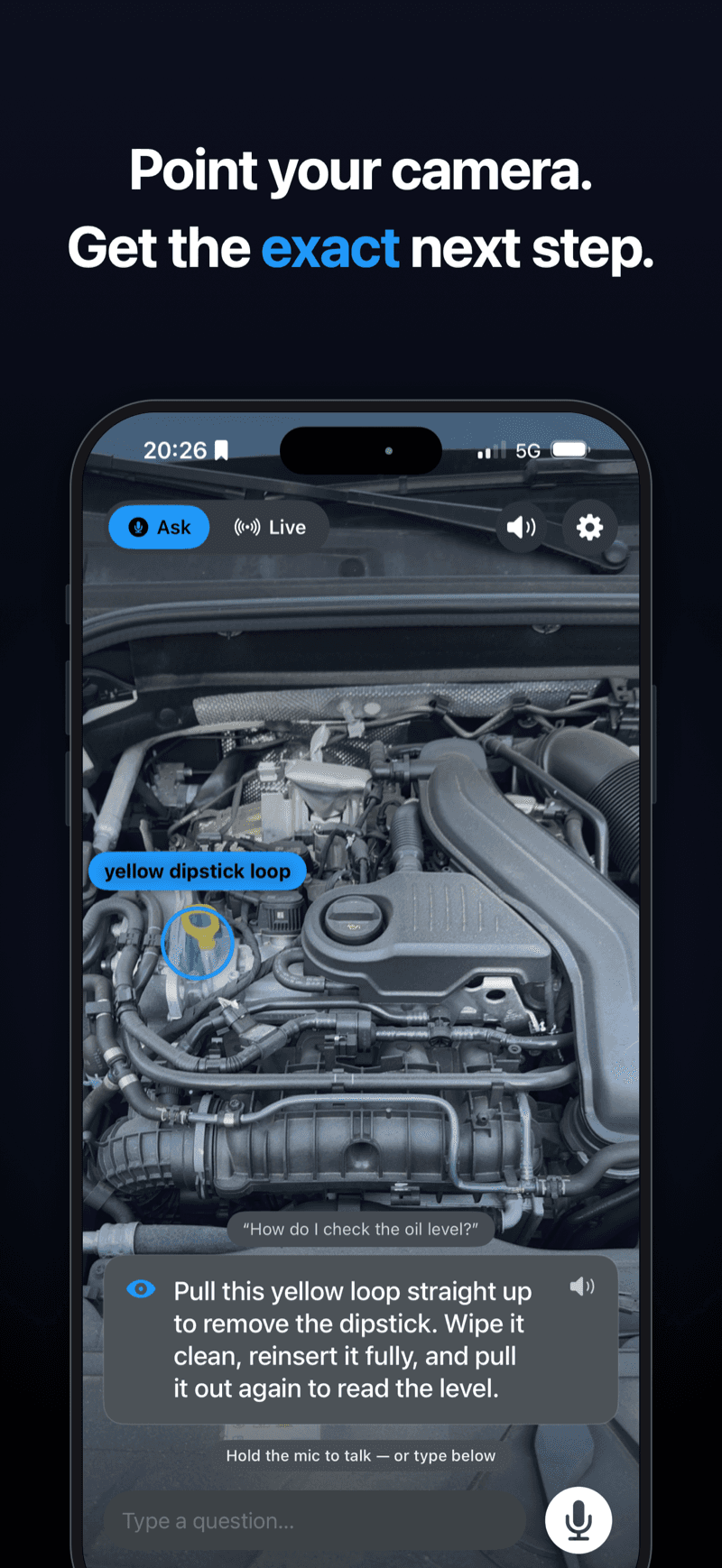 EyeGuide marking the yellow dipstick loop in a car engine bay while answering how to check the oil